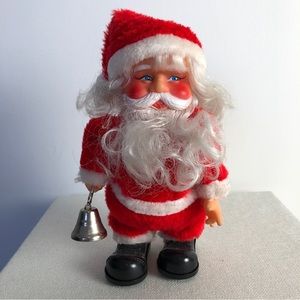 Vintage 80s toy Santa on wheels